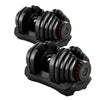 Pair of adjustable dumbbells on a white background