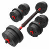 A pair of adjustable dumbbells with black weight plates and red accents, including a textured black and red handle, shown on a solid white background.