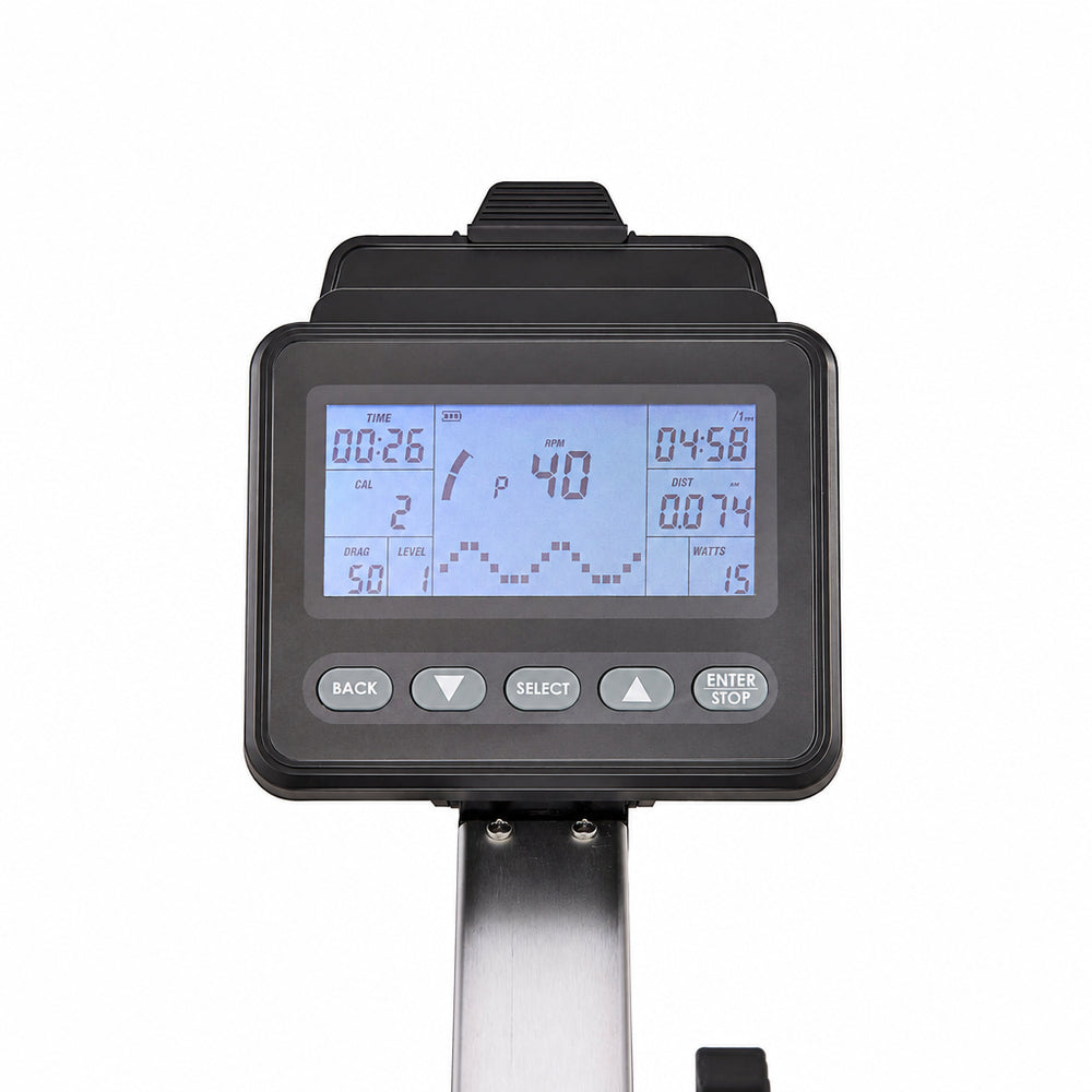 A close-up of a rowing machine console with a black housing, silver metal stem, and a blue backlit digital display screen showing workout metrics.