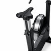 Seat of an exercise bike on a white background
