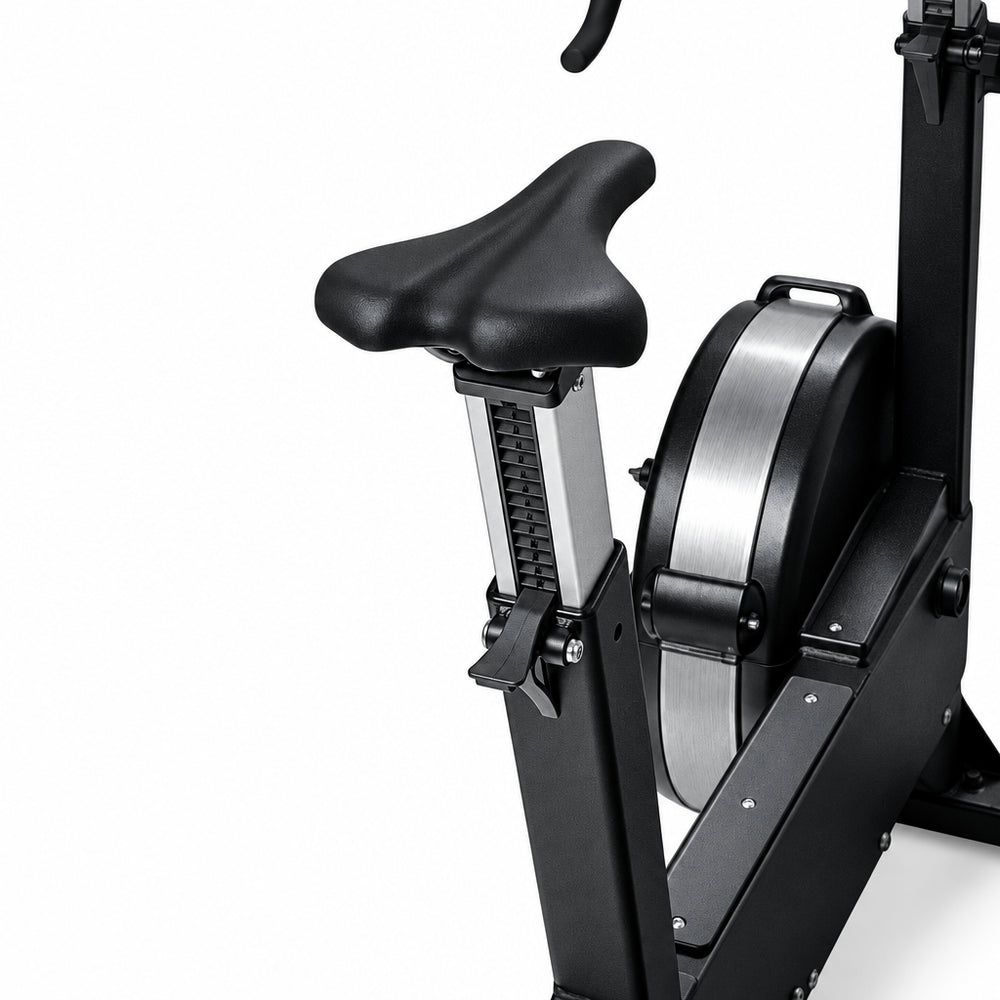 Seat of an exercise bike on a white background