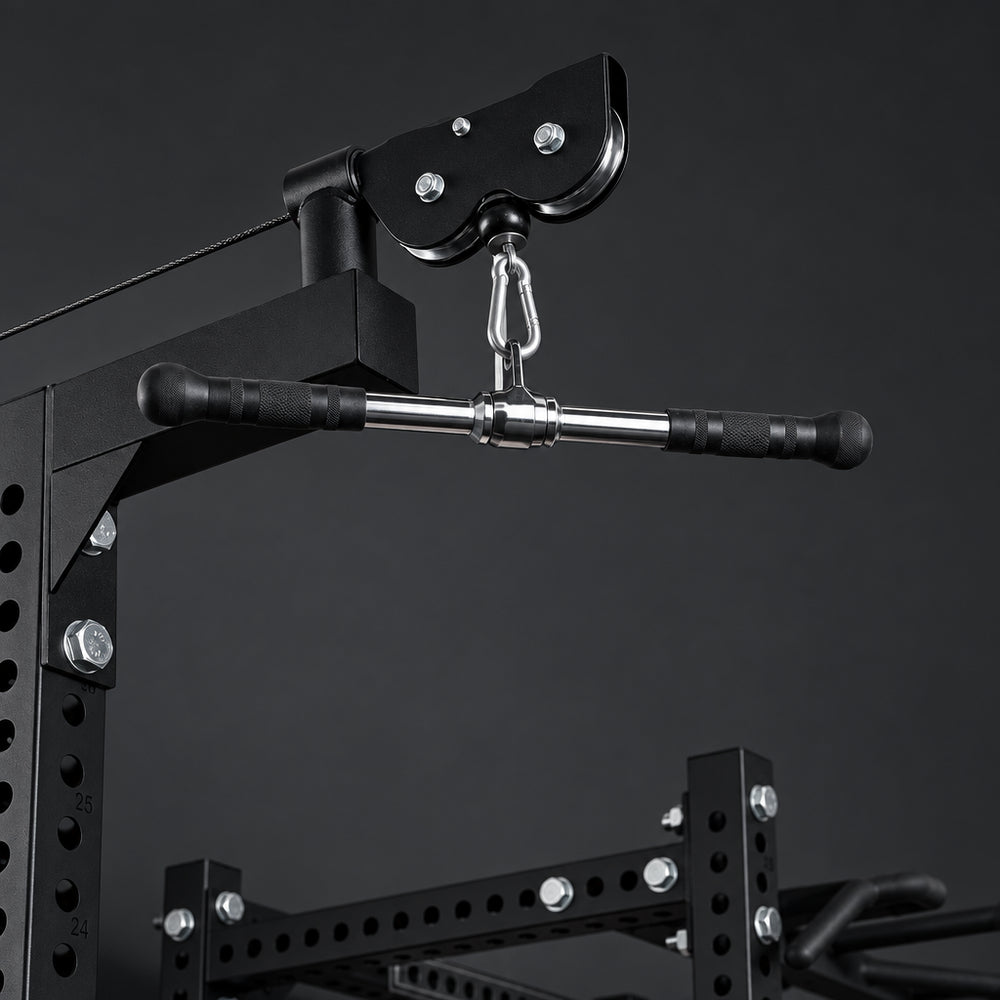 Gym cable machine with straight bar attachments against neon lights