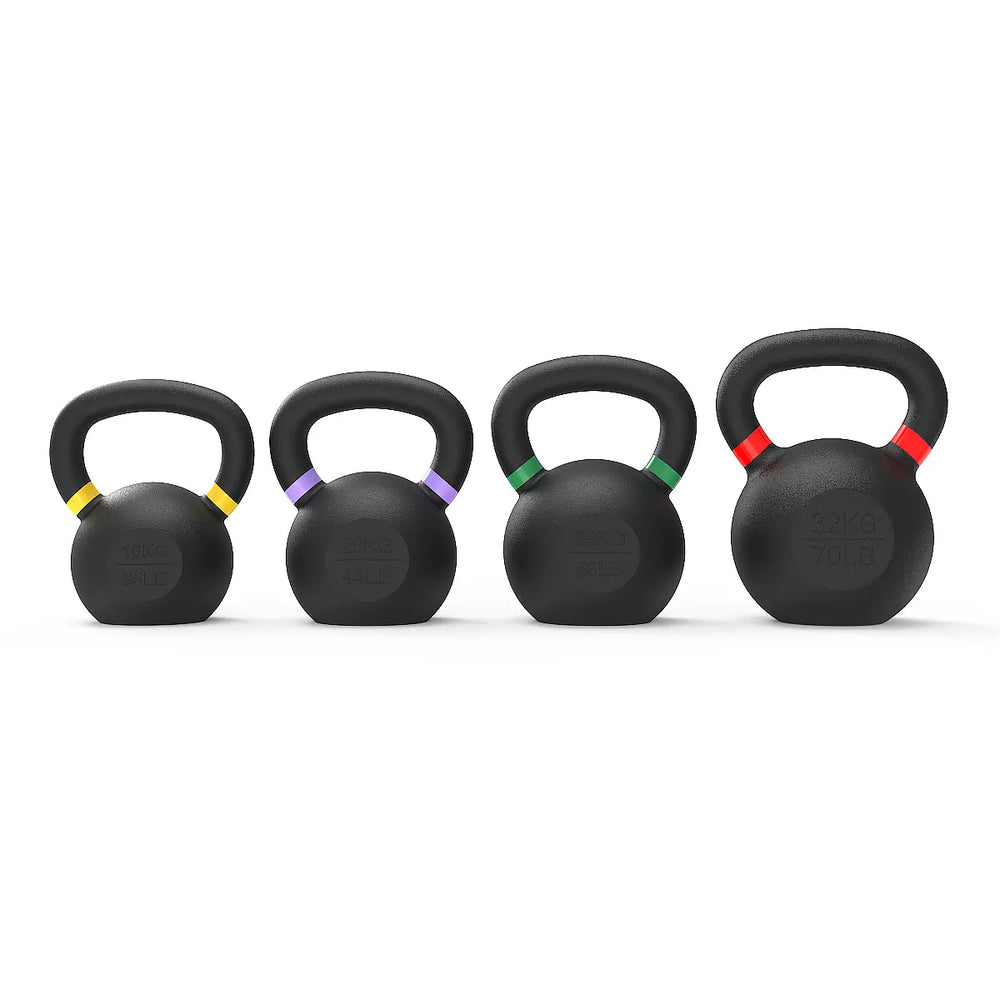 Four black kettlebells lined up in a row on a white background, each with a different colored ring accent on the handle (yellow, purple, green, and red).