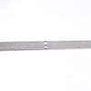 A close-up of a textured metal bar with a knurled pattern on a white background.