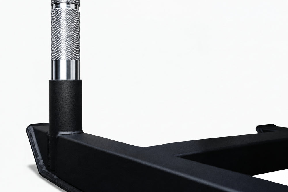 Close-up of a gym power sled on a white background