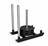 Black weight plates loaded onto a commercial power sled on a white background