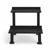Black metal weights rack on a white background