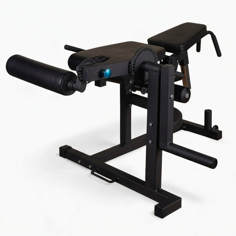 Black frame curl machine with leg extension on a white background