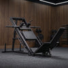Gym equipment including a leg press machine and weight rack