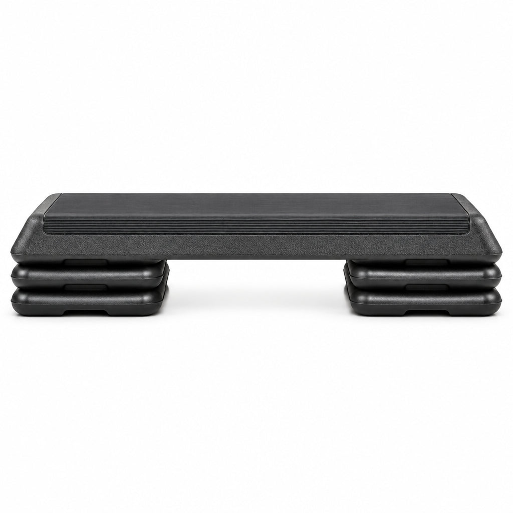 A stack of four black step platforms for exercise, shown on a clean white background. Main image
