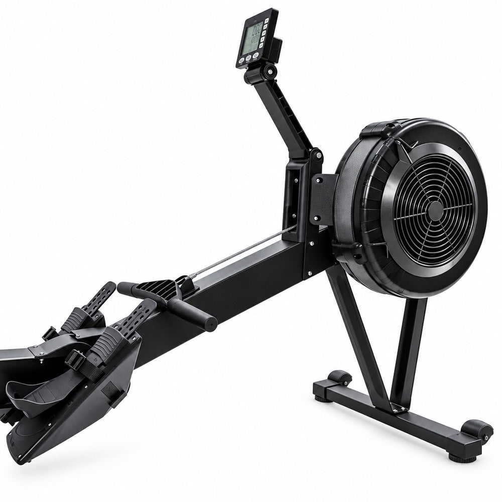 A black rowing machine with an attached digital display screen and foot pedals, photographed on a plain white background.