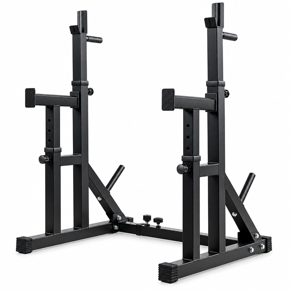 Black steel squat rack with dual uprights, safety arms, and foot pegs on a plain white background.