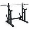 Black weightlifting squat rack with bar on a white background