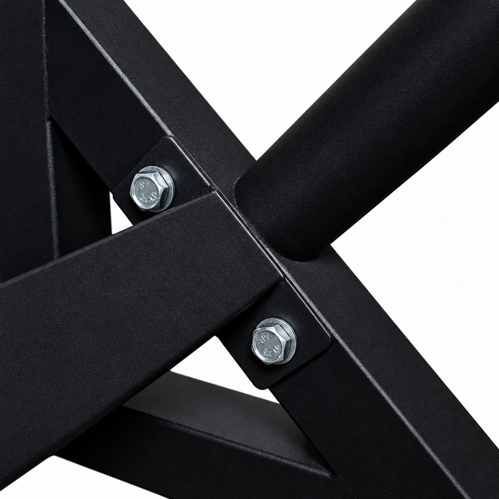 Close-up of a black metal frame with screws on a white background