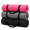 3 rolled black yoga mat with a carrying strap, shown on a white background