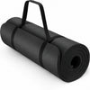 A rolled black yoga mat with a built-in black carrying strap, shown on a clean white background. 