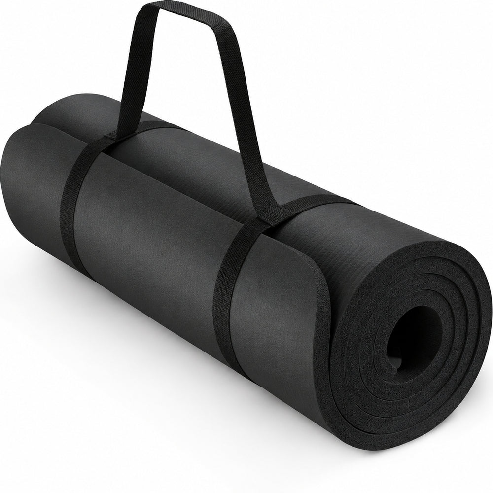 A rolled black yoga mat with a built-in black carrying strap, shown on a clean white background. 