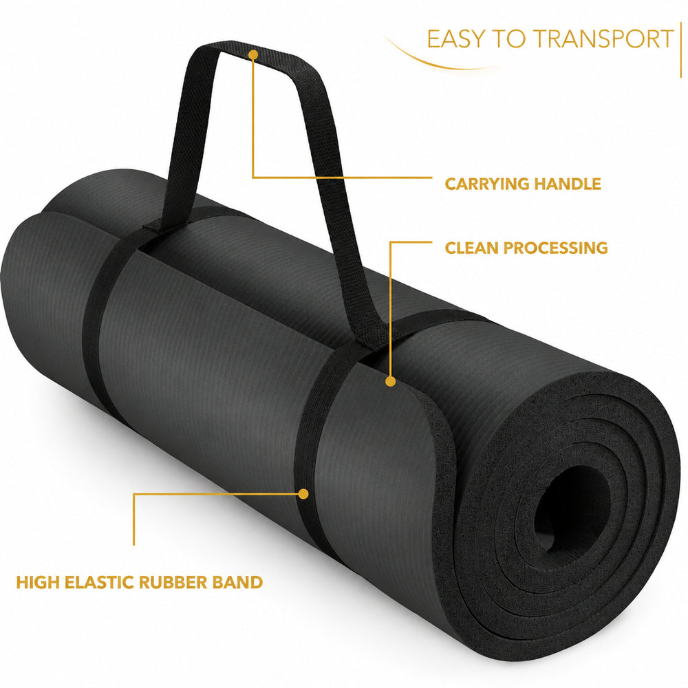A black yoga mat shown rolled up on a white background