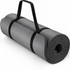 Grey yoga mat rolled up with carry strap on a white background