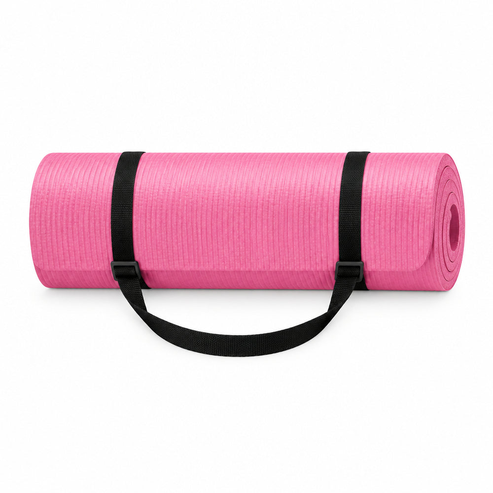 A pink rolled-up yoga mat with black carrying straps, shown on a clean white background. 