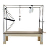 GS Essential Cadillac Reformer in dark grey shown from the front with roll-down bar and fuzzy handles