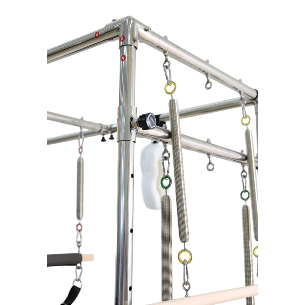 Close-up of the frame joint, adjustment knob and hanging springs on the Cadillac reformer tower