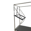 Close-up of the top corner of the trapeze frame with springs and adjustable straps