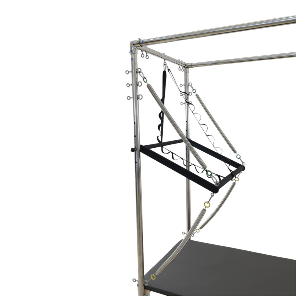 Close-up of the top corner of the trapeze frame with springs and adjustable straps