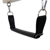 Close-up of the padded trapeze handle bar with adjustable straps on the Cadillac reformer