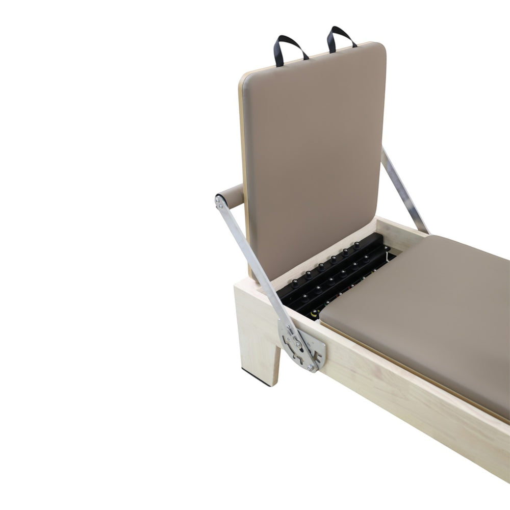Gym Superstore professional wooden Pilates reformer with beige padded carriage and adjustable spring system