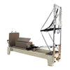 Gym Superstore professional wooden Pilates reformer with integrated tower attachment and taupe padded carriage