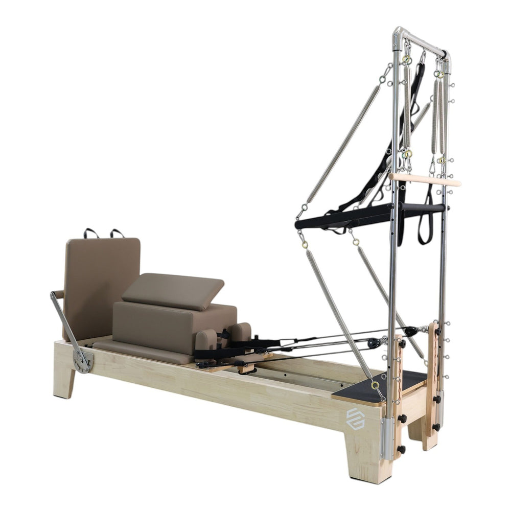 Gym Superstore professional wooden Pilates reformer with integrated tower attachment and taupe padded carriage