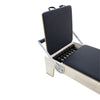Gym Superstore professional wooden Pilates reformer with black upholstered carriage and adjustable spring system