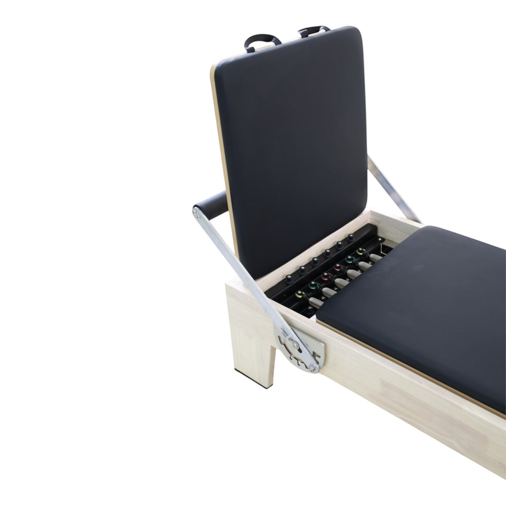 Gym Superstore professional wooden Pilates reformer with black upholstered carriage and adjustable spring system